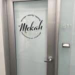 Mekah's Body Shop door with logo in Burbank, California.