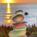 Colorful, semi translucent rocks, stacked in a neat pile