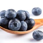 Blueberries in wooden spoon