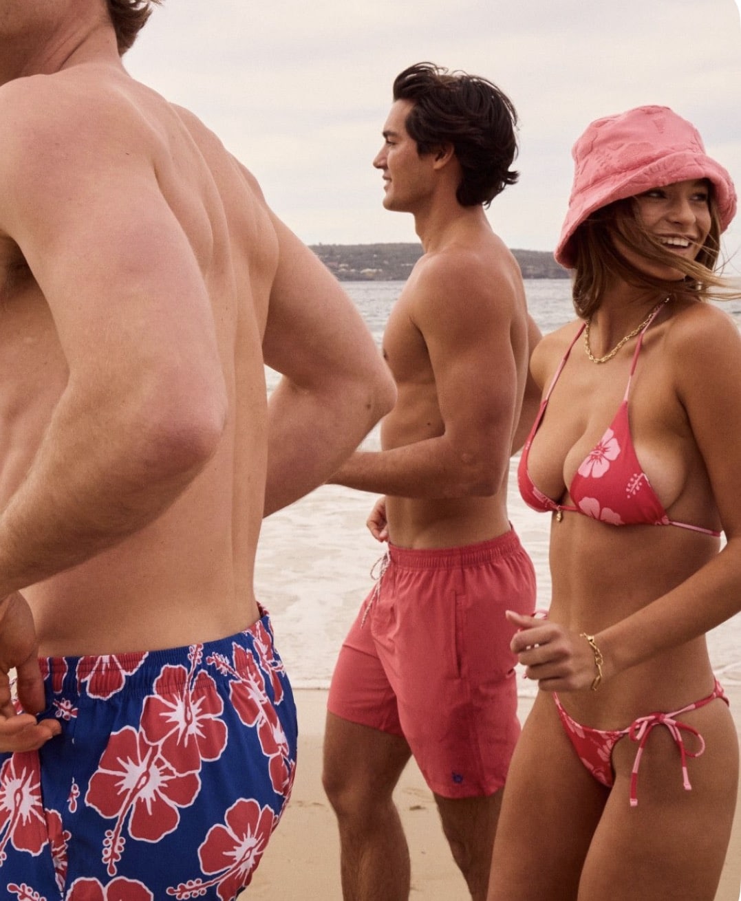 people in bathing suits on a beach